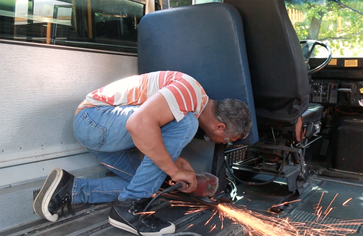 Angle grinder to remove bus seats