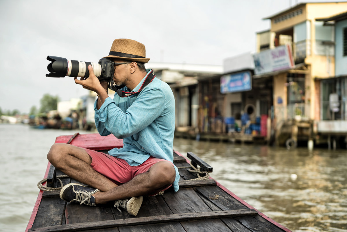 Jose-Taking-Photo-Telephoto-Lens-Boat-Vietnam